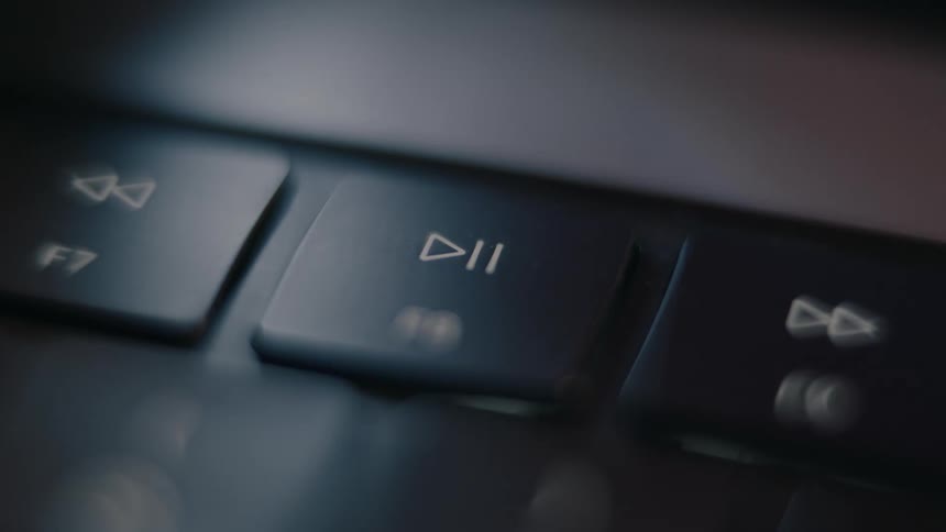 A clip of a person pressing a keyboard