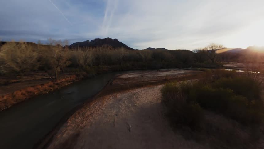 Sparse vegetation landscape with a winding river