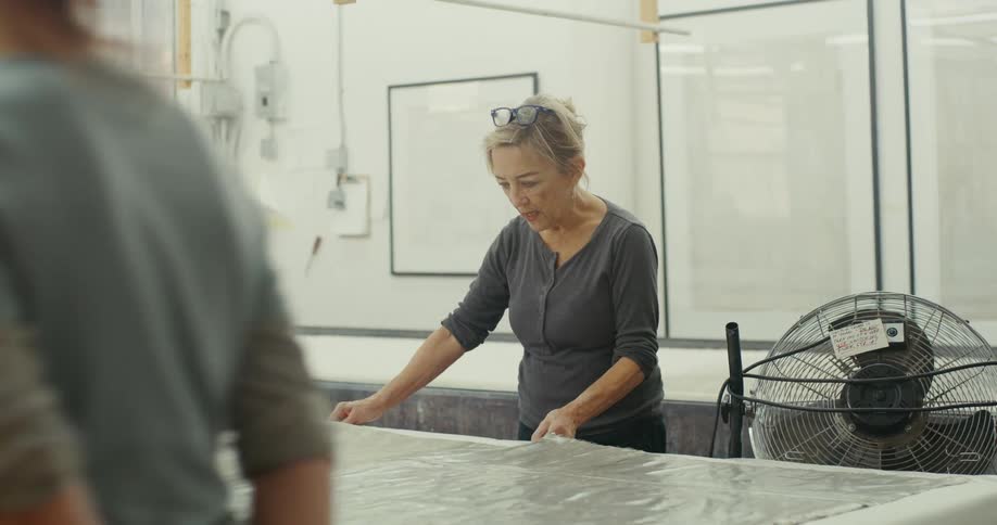 Two women working indoors