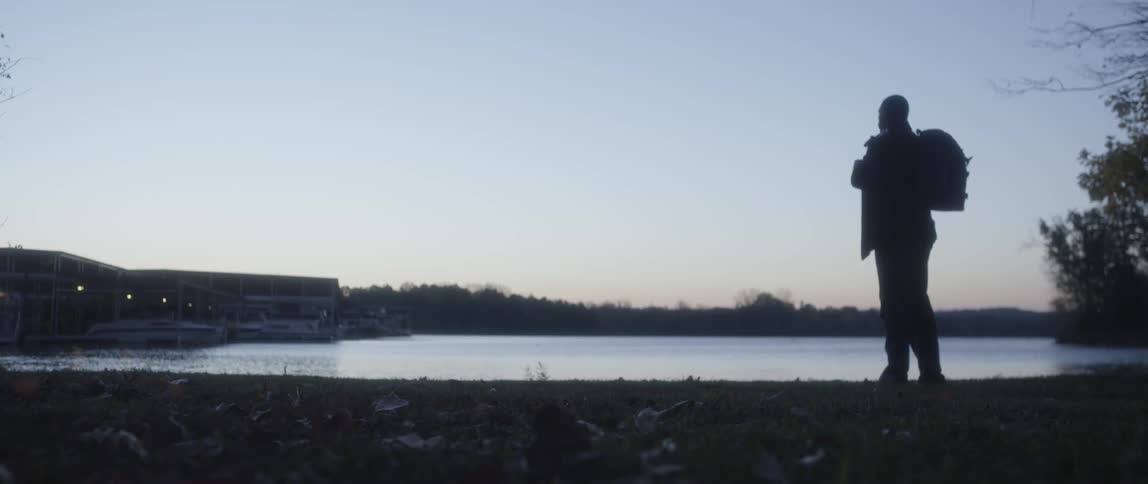 Boats docked at a lake