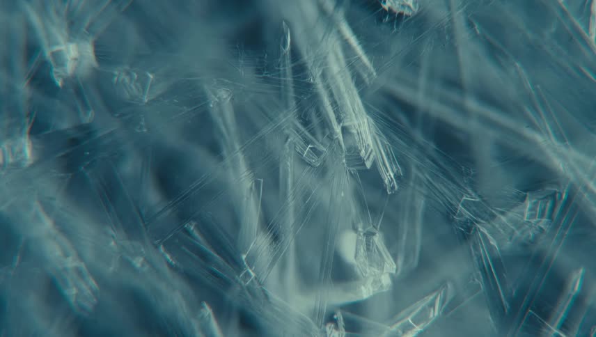 Ice crystals forming in water