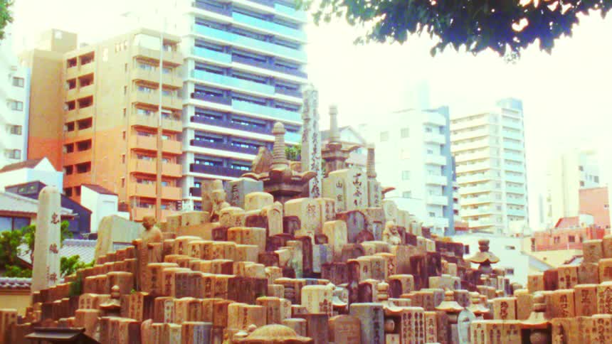A shrine consisting of several stones with writing on them is set up in a pyramid shape
