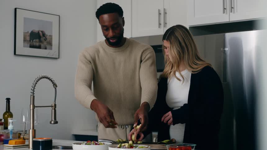 Couple in the kitchen cooking together