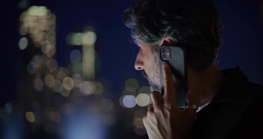 Bearded man talking on a call
