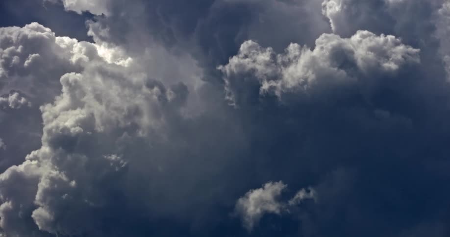 Large clouds roll by during the day