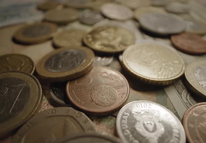 A revealing clip of some currency on a table