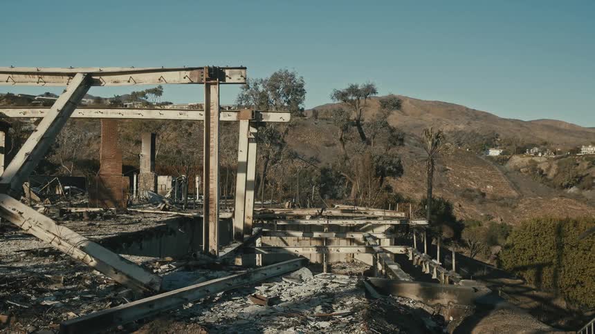 A clip of a destroyed building in a mountainous area