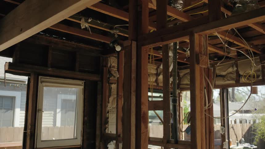 Home Remodel Project Showing Open Studs and Electrical Wires