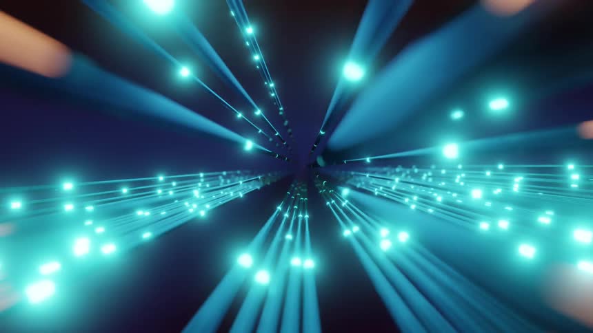 Streaks of light create a tunnel effect against a gray background