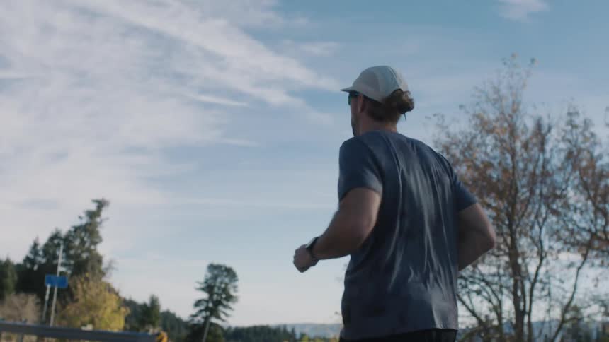 Man running in a trail environment