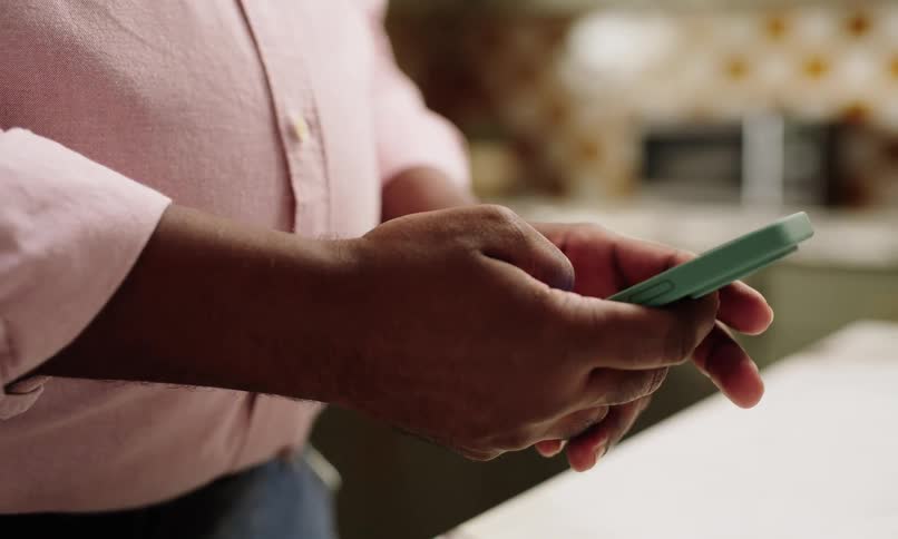Pair of hands using a smartphone