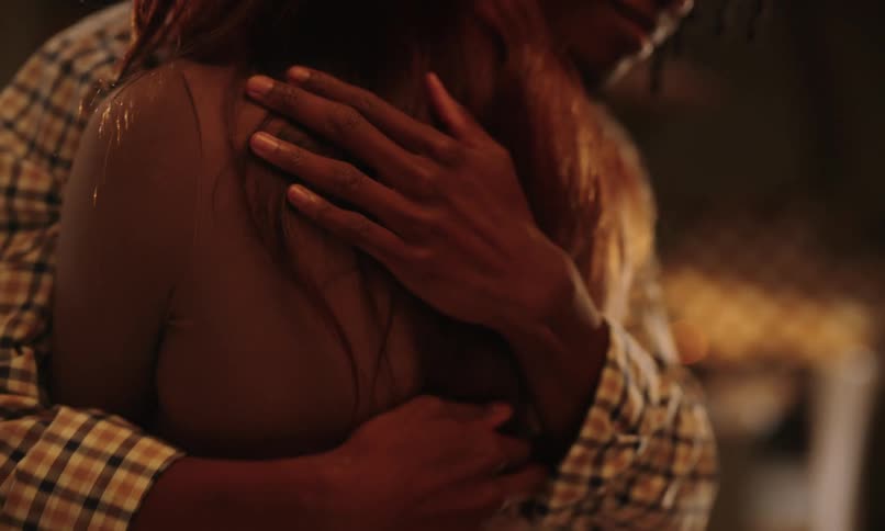 Couple hugging each other affectionately
