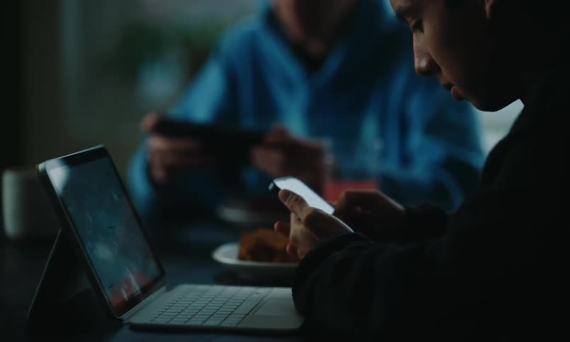 A clip of boys operating a smartphone