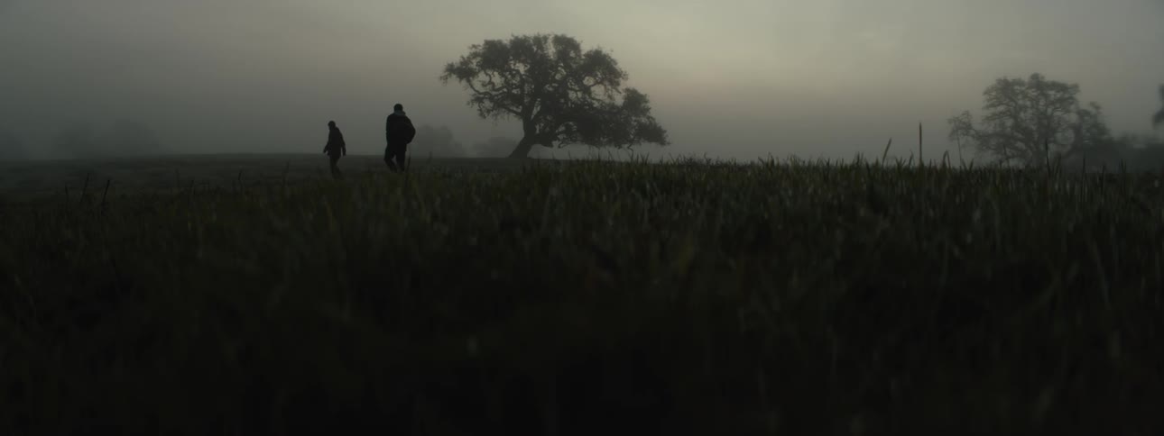 A clip of people hiking the grassland