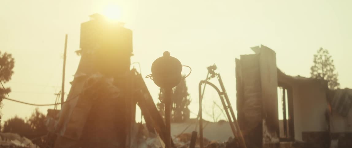 The home is burned down to rubble
