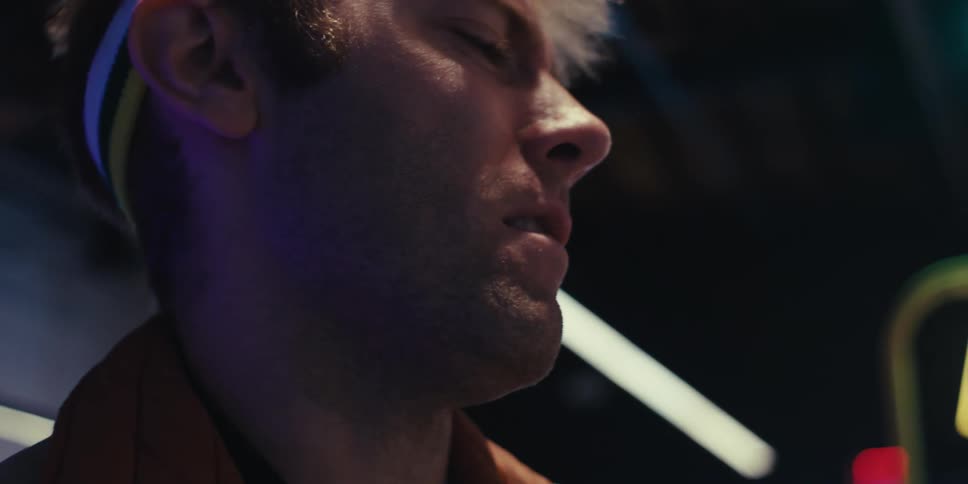 A man is having fun in the arcade