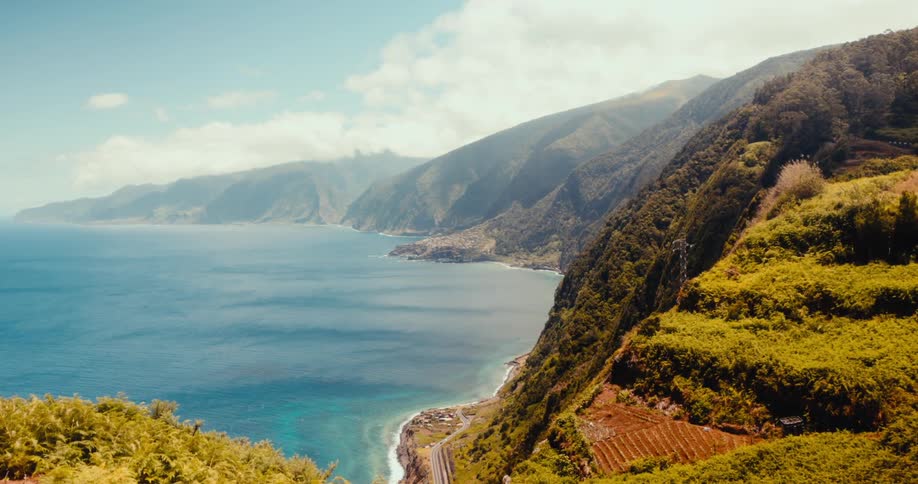 Landscape of a greenish coast by the sea