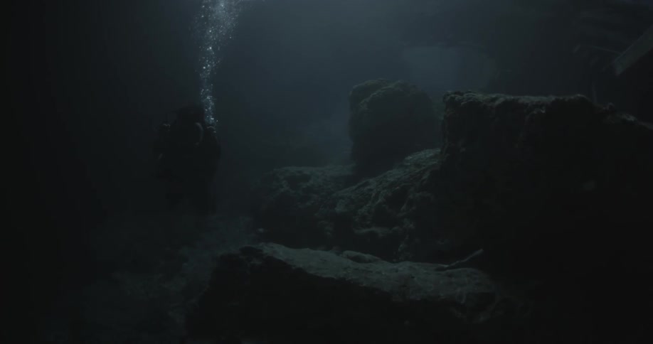 A scuba diver swims underwater