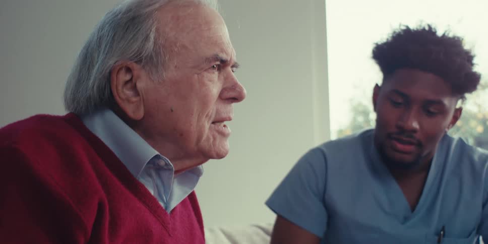 A doctor is talking with a patient
