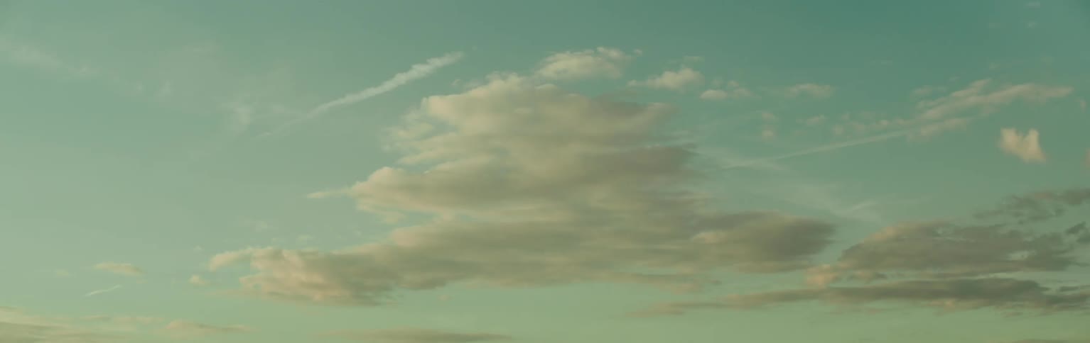 Upward view of a sky with clouds