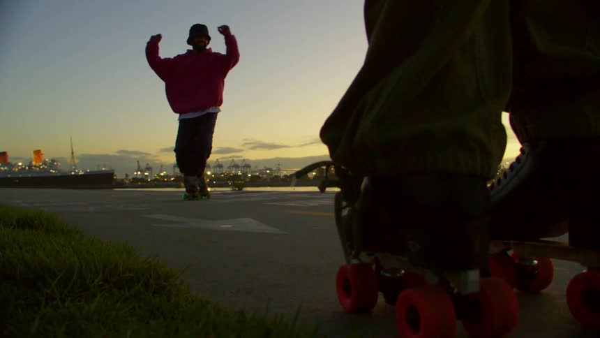 Man on roller skates dancing