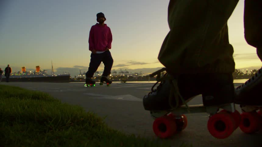 Man on roller skates dancing