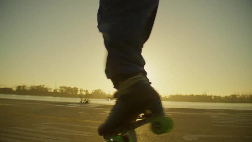 Legs of a person rollerblading