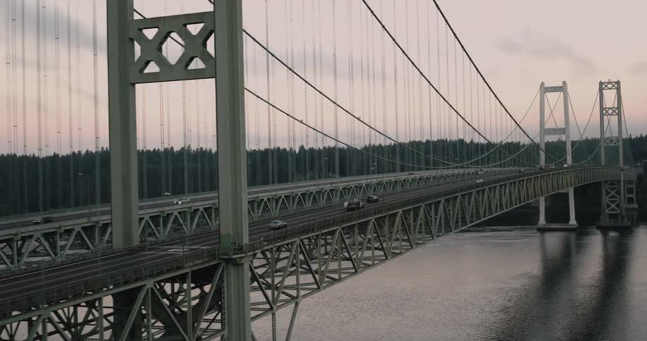 Imposing suspension bridge stretches over calm waters