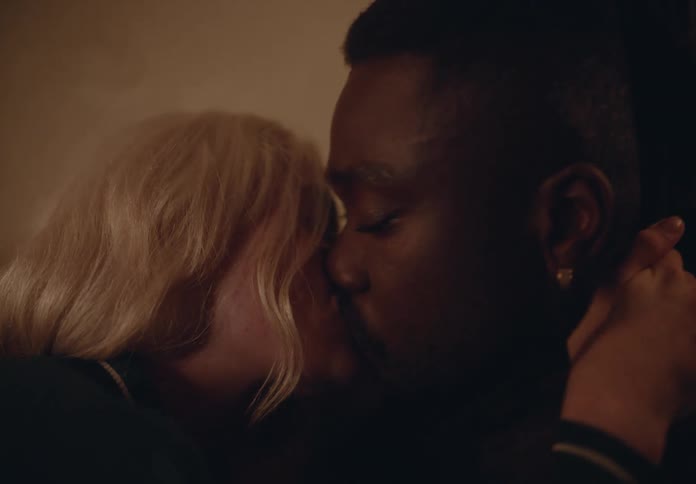 Portrait of a couple kissing warmly