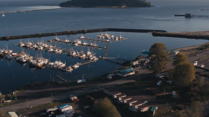 Aerial shot of a dock with stationary yachts and boats