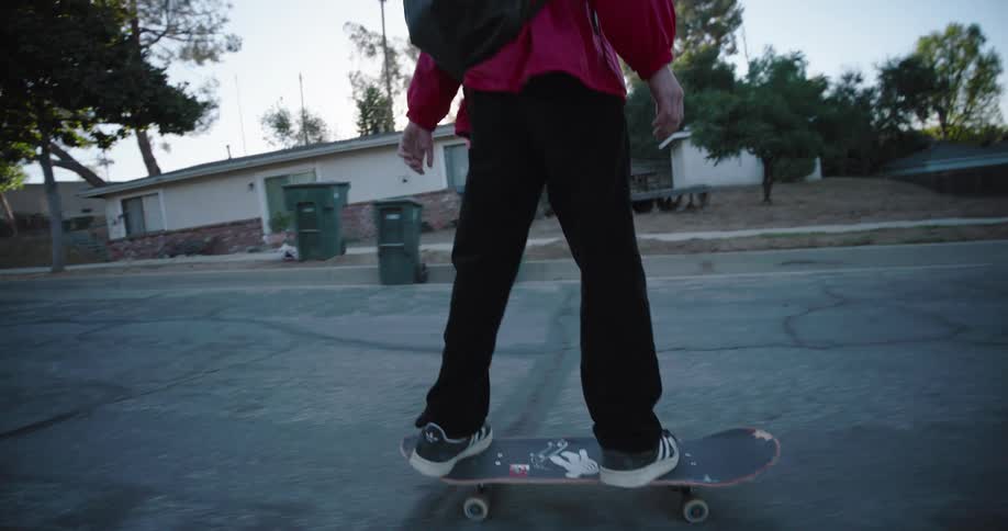 Boy skateboarding on an urban street