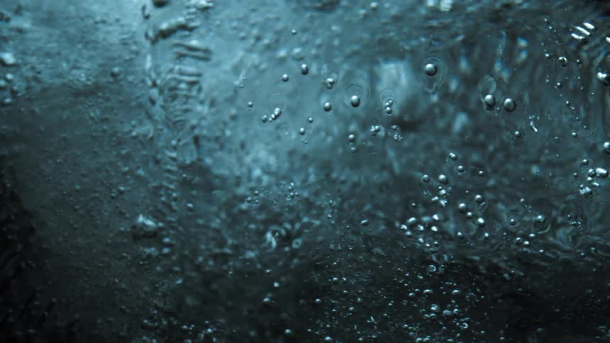 Abstract closeup on an ice with water