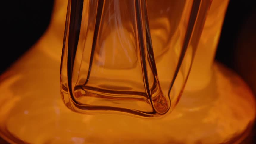The glass melts and pools on the surface