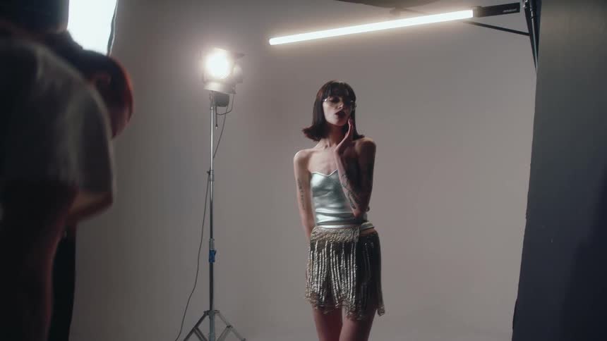 Very skinny female model posing during a photo shoot