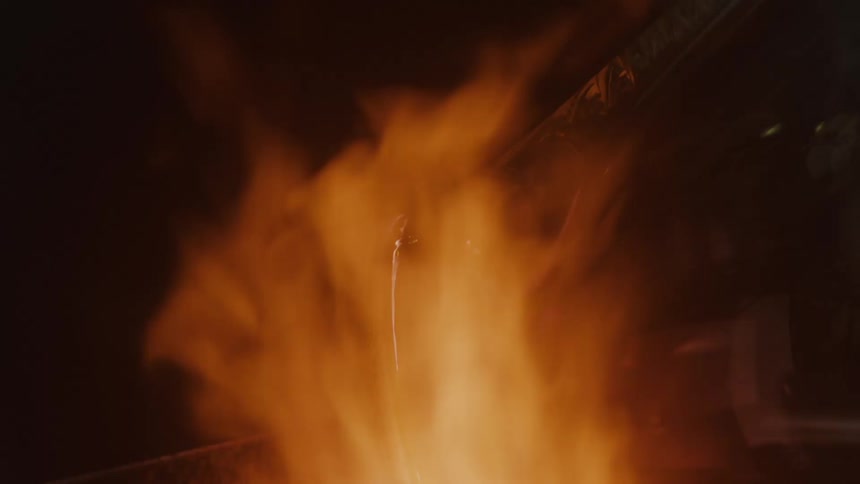 Glass being forged in fire