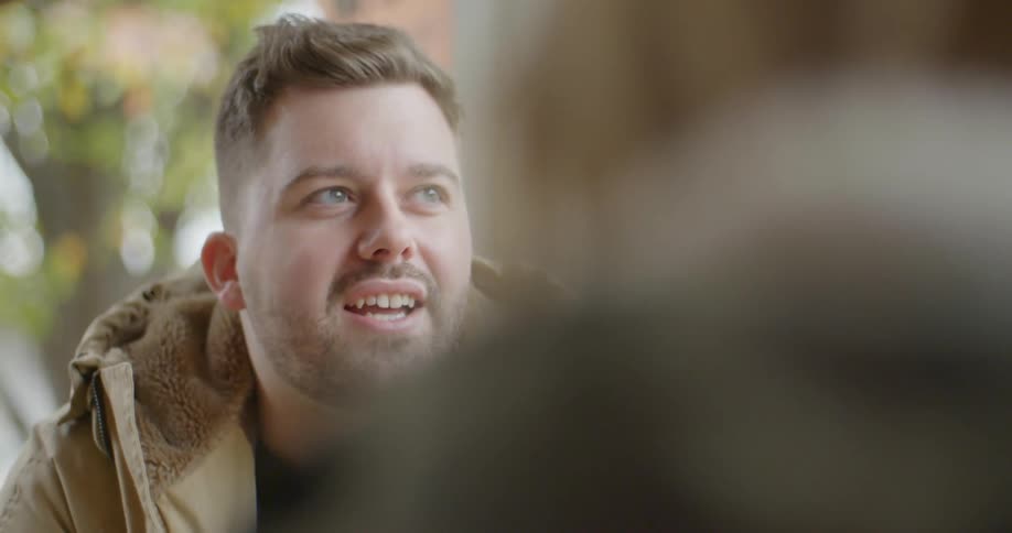 A man is talking with someone