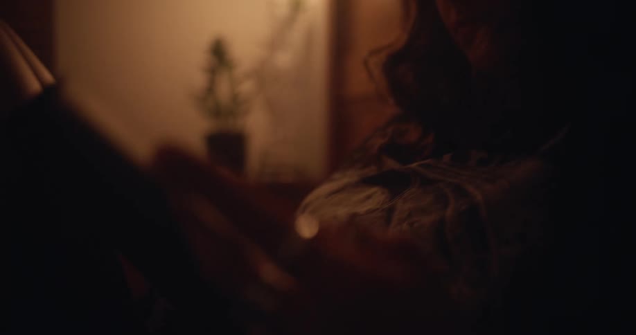 A woman is reading a book