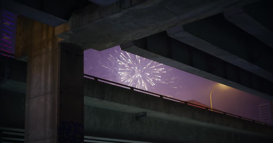 Fireworks are seen between the concrete structures of an overpass or bridge