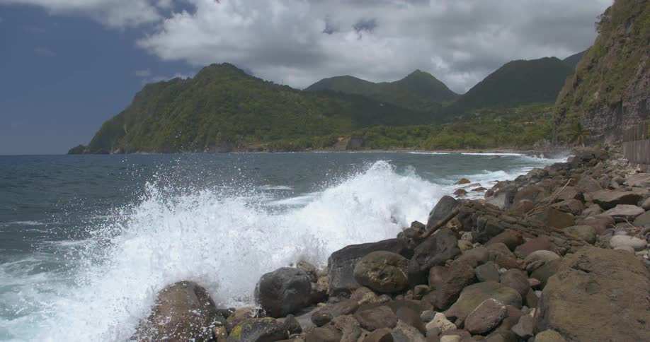 Ocean waves crashing to a rocky shore