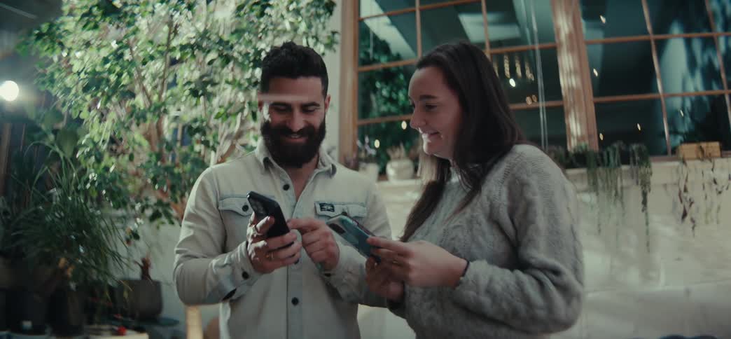 A clip of a lady and a man conversing outdoor