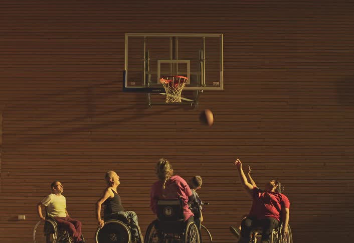 A footage of people playing basketball