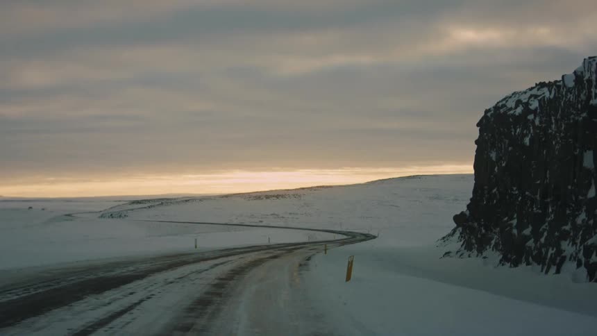 A road runs through the frozen area