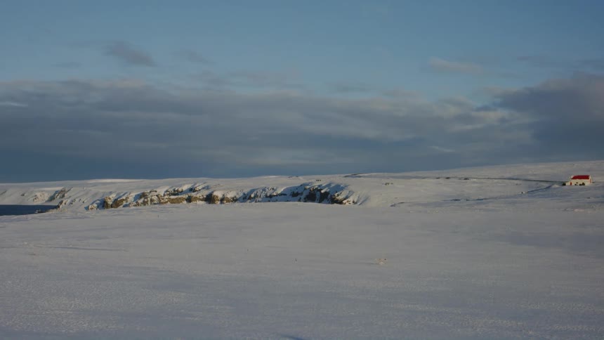 Snow covers the landscape