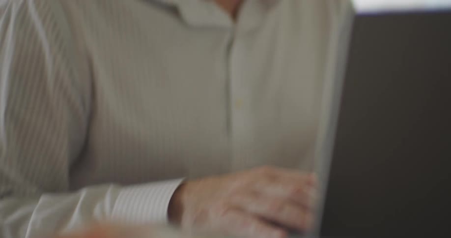 Man sitting down ending a call