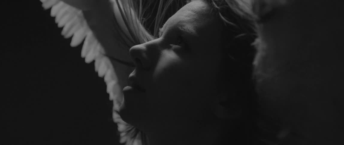 A woman's hair blows in the breeze