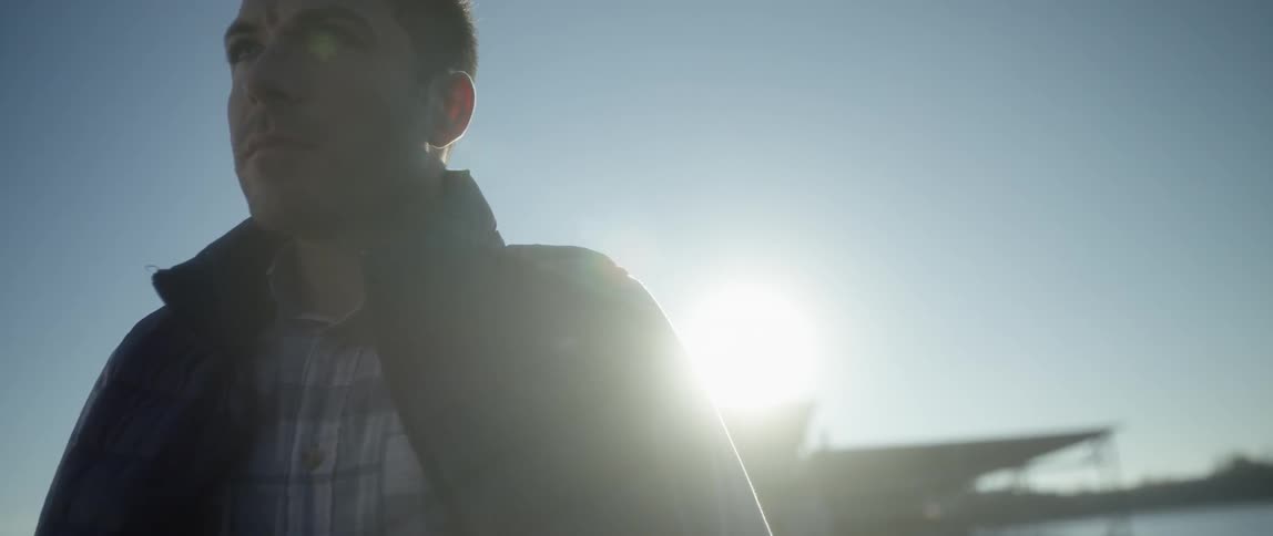 The sun shines on a man