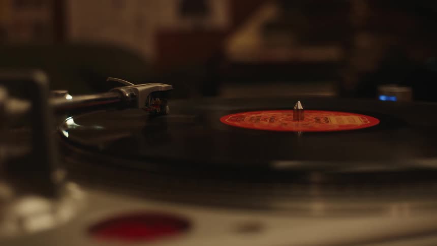 A record spins on the record player