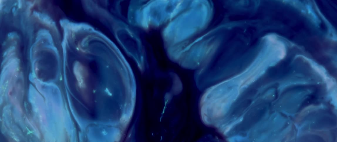 Texture of a dense blue liquid bubbling abstract