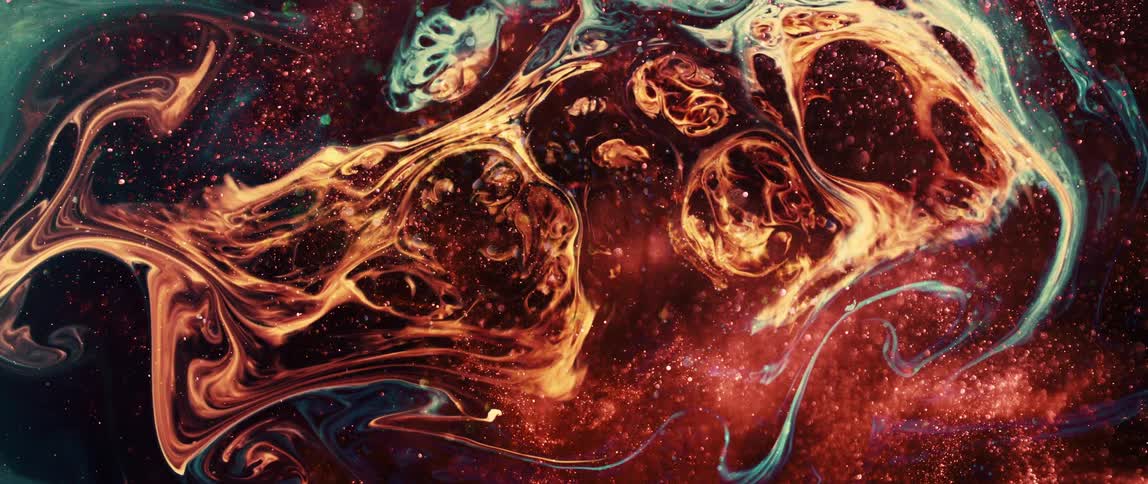 Abstract undulating texture in orange and reddish colors in motion