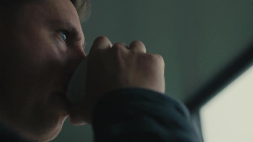 Man drinking from a cup
